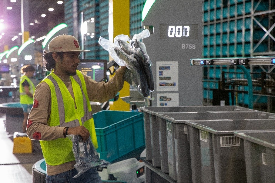 Operator at automated Pick &amp; Pack station